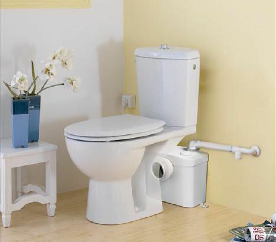 This is a picture of a toilet fitted with a Saniflo macerator